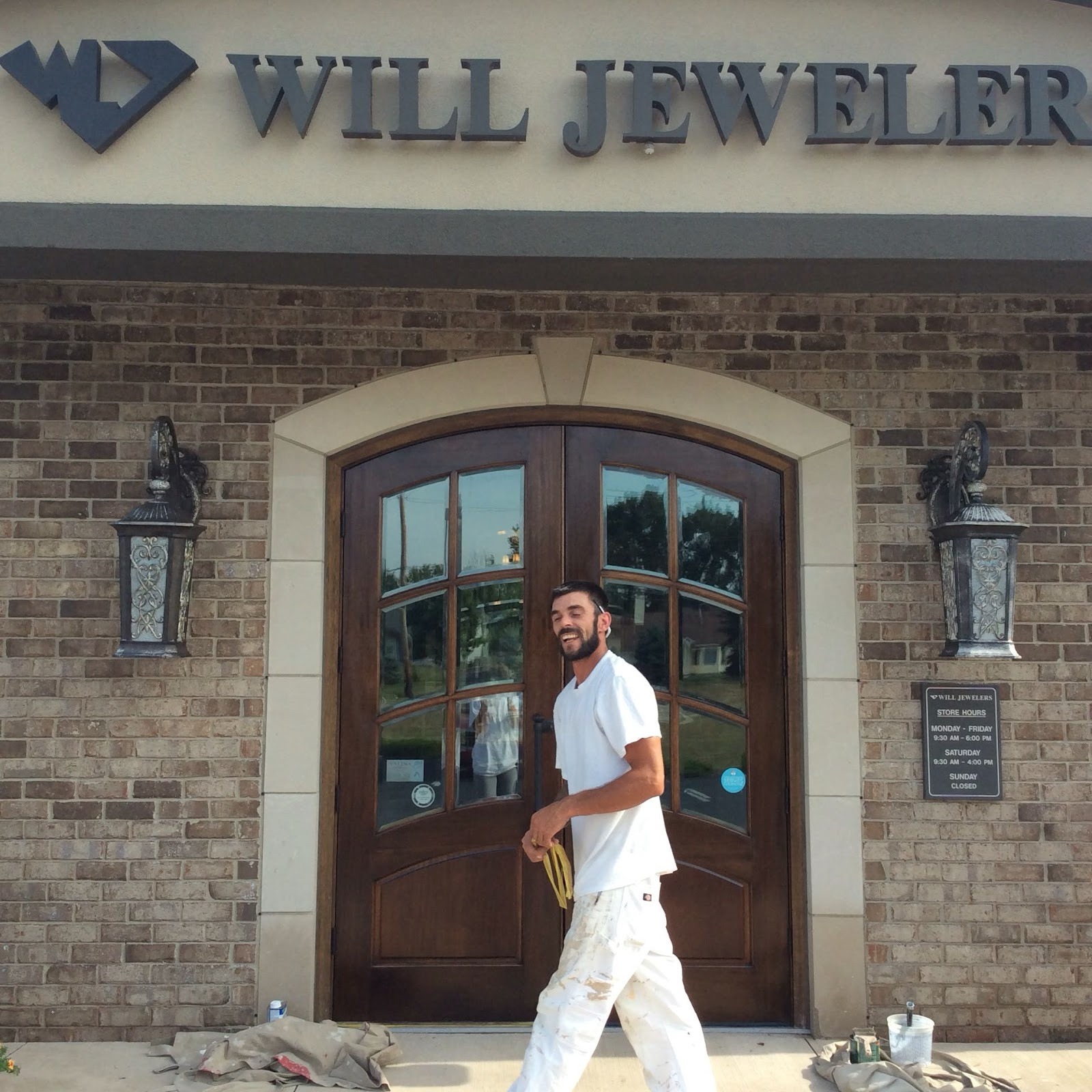 Commercial storefront entry repainted in Fort Wayne