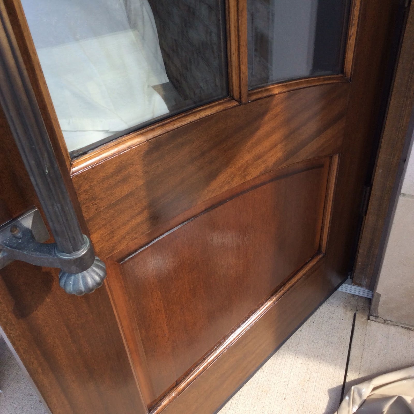 Restained door with a leaded glass panel, close detail